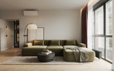 Moderne woonkamer met grote ramen en groene bank